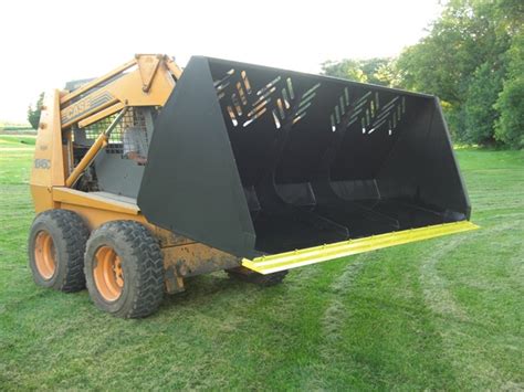 how many tons in a skid steer bucket|2 yard skid steer bucket.